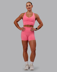 Woman wearing Evoke Sports Bra in Pink Lemonade | Size:S | Thumbnail Index: 6