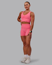 Woman wearing Evoke Sports Bra in Pink Lemonade | Size:S | Thumbnail Index: 4