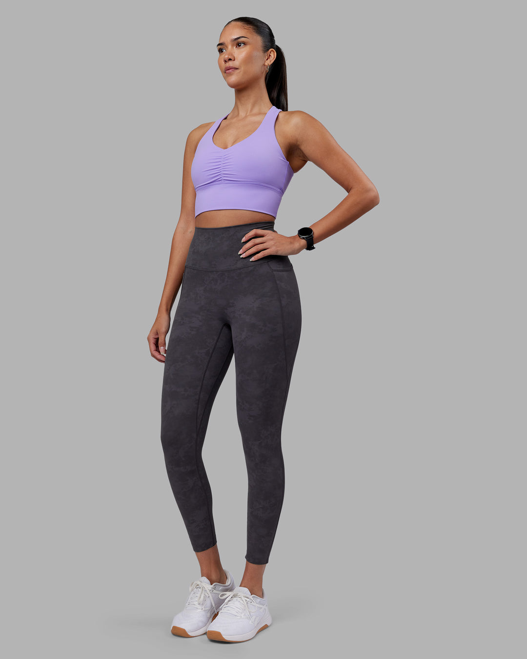 Woman wearing Evoke Longline Sports Bra - Violet Ray | Model:Rhiley | Size:S - view 6