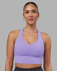 Woman wearing Evoke Longline Sports Bra - Violet Ray | Model:Rhiley | Size:S | Thumbnail Index: 4