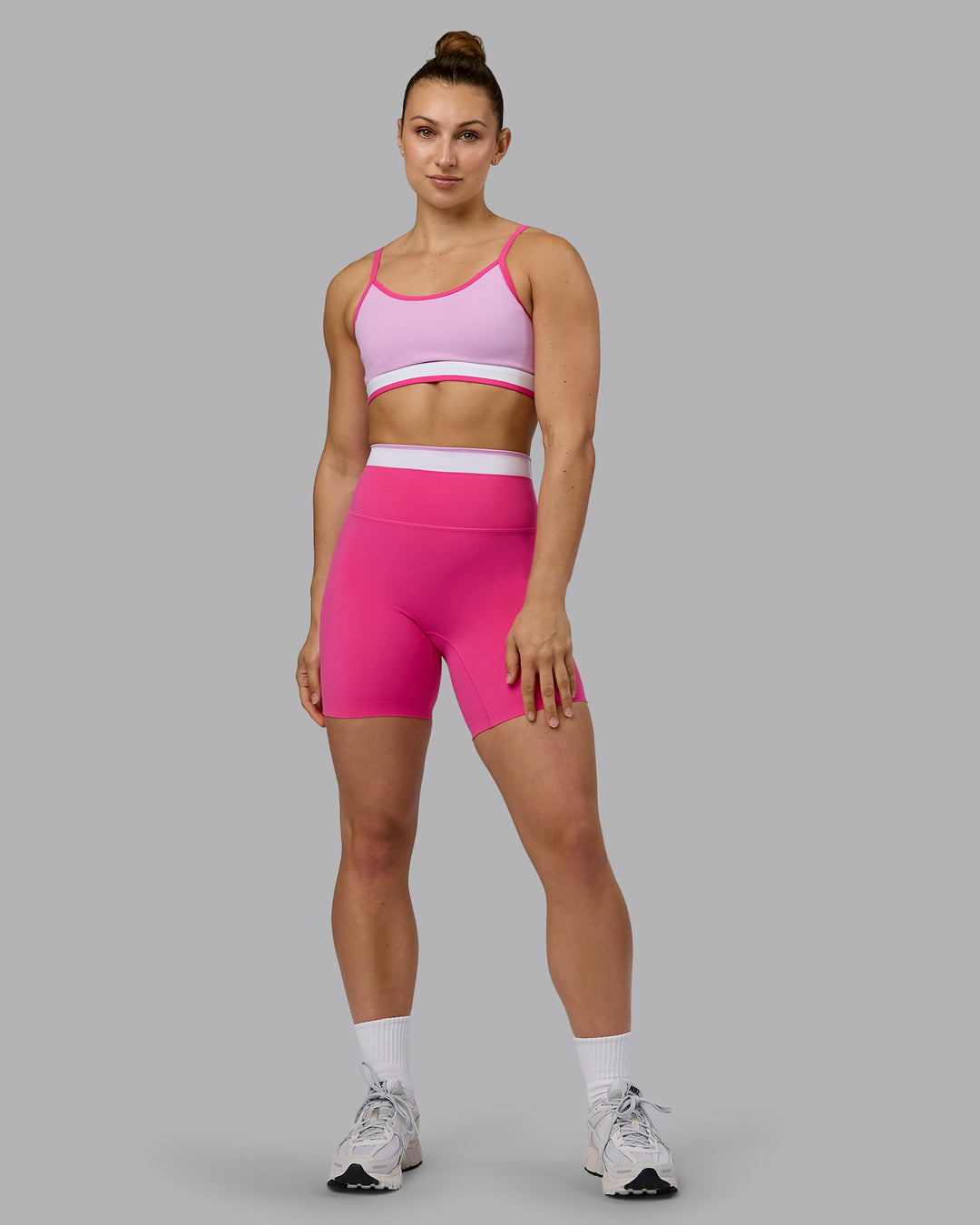 Woman wearing Excel Ultra High-Rise 6" Short - Ultra Pink - view 9