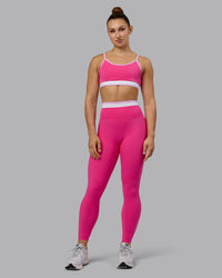 Woman wearing Excel Sports Bra - Ultra Pink | Thumbnail Index: 6