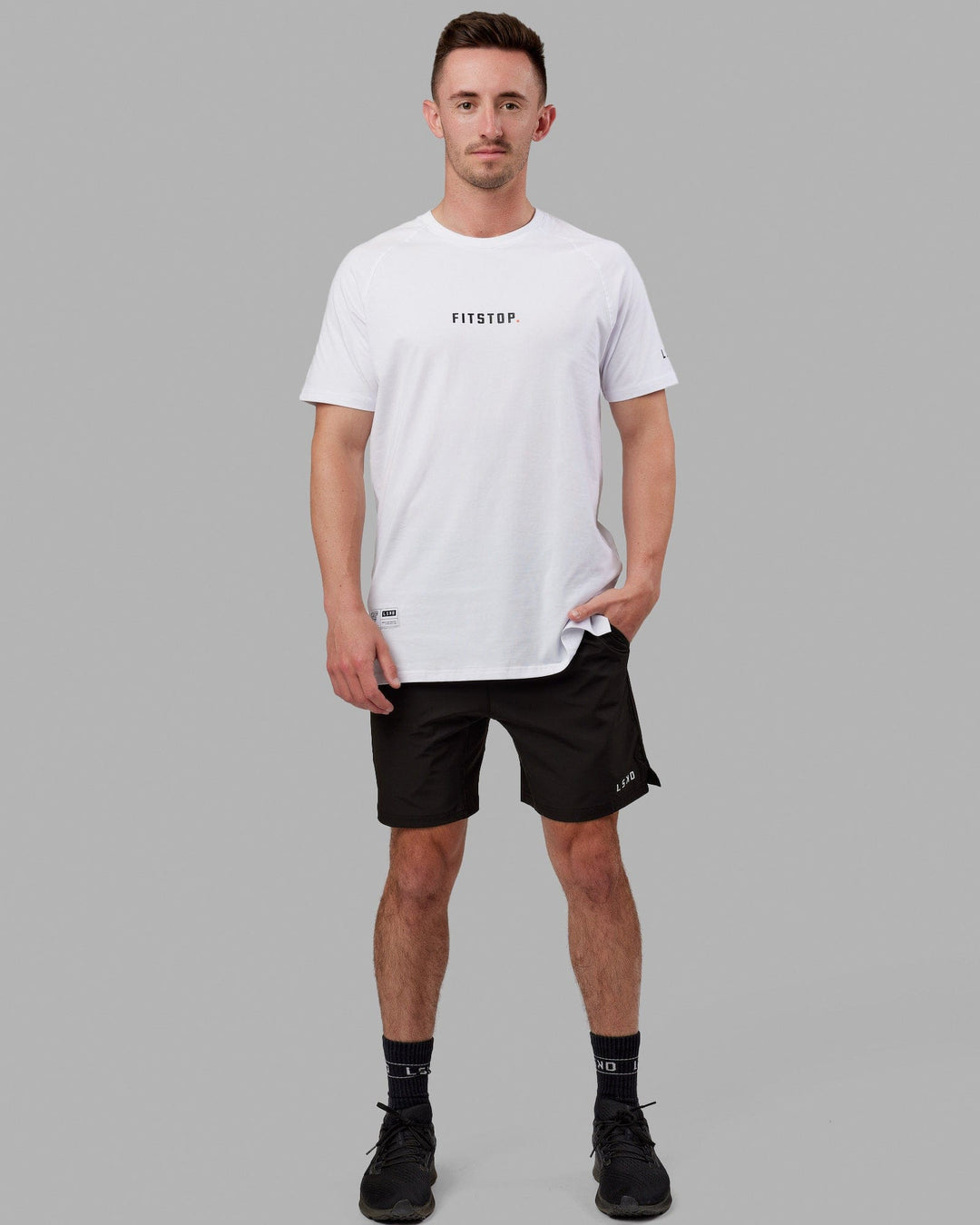Man wearing Fitstop Optimal Tee - White - view 2