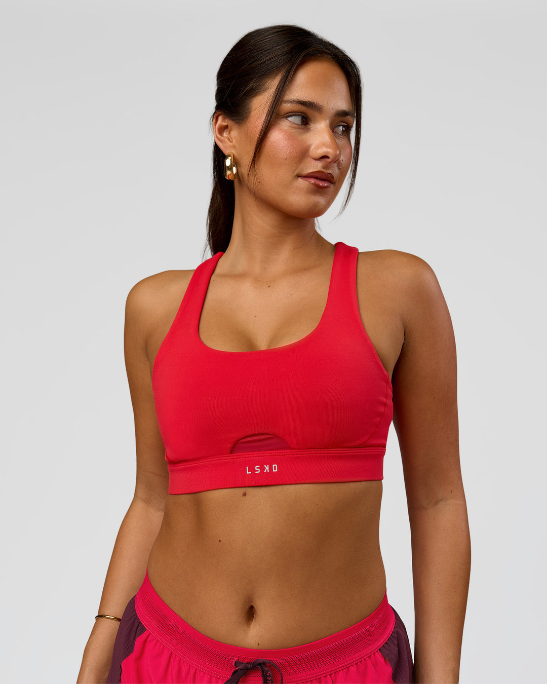 Woman wearing Fast Track Sports Bra Scarlet | Model:Bianca | Size:S | - view 4