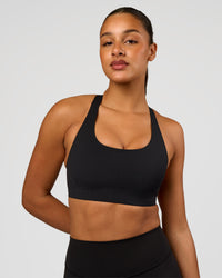 Woman wearing Flow Bonded Scoop Neck Sports Bra - Black | Model:Rosie | Size:S | Thumbnail Index: 5