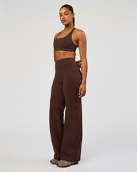 Woman wearing Flow Bonded Scoop Neck Sports Bra - Hot Chocolate | Model:Rosie | Size:S | Thumbnail Index: 4