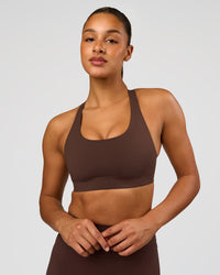 Woman wearing Flow Bonded Scoop Neck Sports Bra - Hot Chocolate | Model:Rosie | Size:S | Thumbnail Index: 1