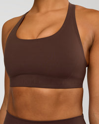 Woman wearing Flow Bonded Scoop Neck Sports Bra - Hot Chocolate | Model:Rosie | Size:S | Thumbnail Index: 2