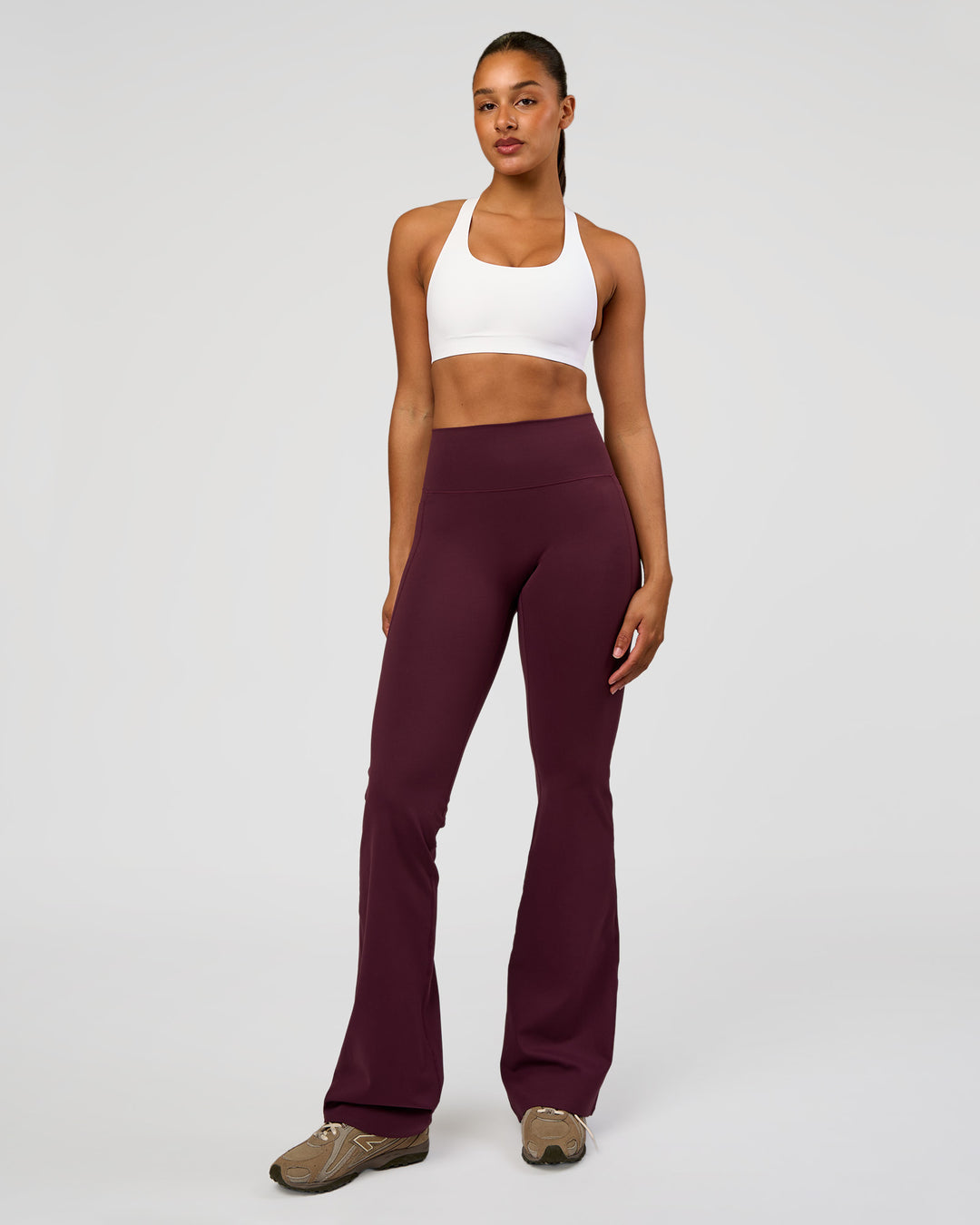 Woman wearing Flow Bonded Scoop Neck Sports Bra - White | Model:Rosie | Size:S - view 3
