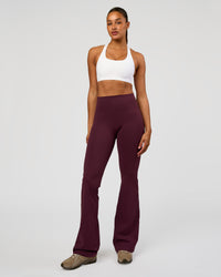 Woman wearing Flow Bonded Scoop Neck Sports Bra - White | Model:Rosie | Size:S | Thumbnail Index: 2