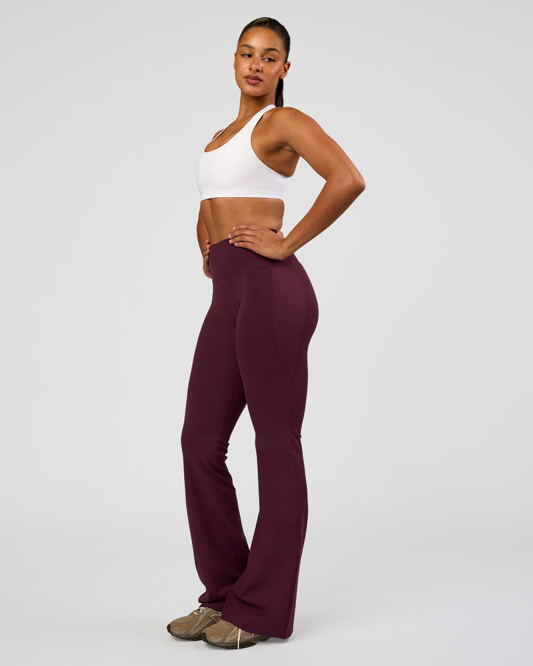 Woman wearing Flow Bonded Scoop Neck Sports Bra - White | Model:Rosie | Size:S - view 5