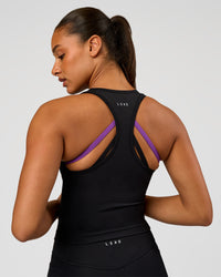 Woman wearing Flow Graphic Performance Tank 2.0 - Black-Radiate | Model:Rosie | Size:S | Thumbnail Index: 0