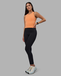 Woman wearing Flow Performance Tank 2.0 - Cantaloupe | Model:Rhiley | Size:S | Thumbnail Index: 4