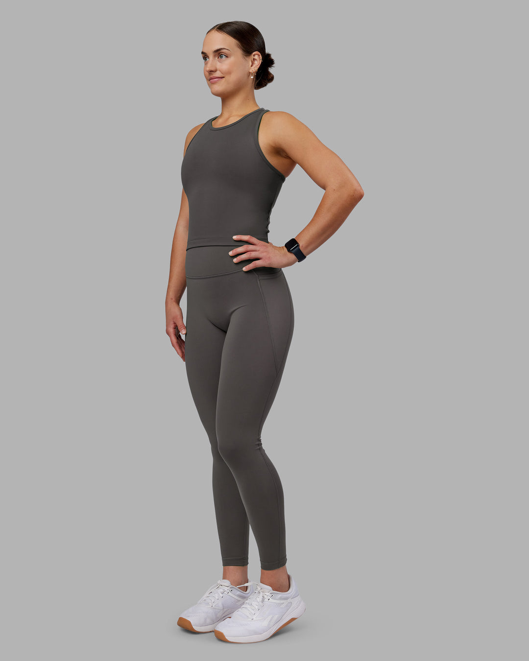 Woman wearing Flow Performance Tank 2.0 - Dark Storm | Model:Keisha | Size:S - view 4