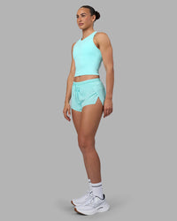 Woman wearing Flow Performance Tank 2.0 - Island Paradise | Model:Sophie | Size:S | Thumbnail Index: 4