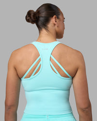 Woman wearing Flow Performance Tank 2.0 - Island Paradise | Model:Sophie | Size:S | Thumbnail Index: 6