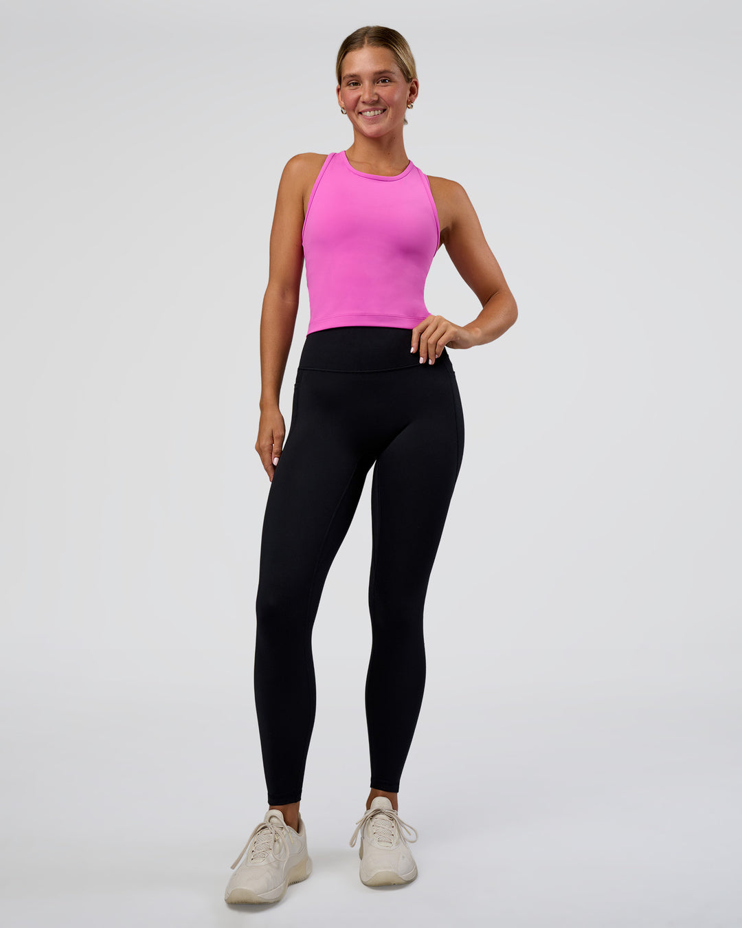 Woman wearing Flow Performance Tank 2.0 - Ultra Fuchsia | Model:Amity | Size:S - view 2