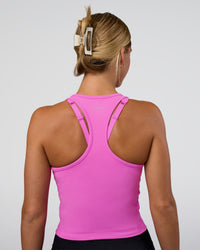 Woman wearing Flow Performance Tank 2.0 - Ultra Fuchsia | Model:Amity | Size:S | Thumbnail Index: 2