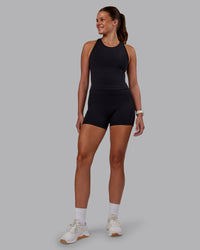 Woman wearing Flow Performance Tank - Black | Model:Phoebe | Size:S | Thumbnail Index: 4