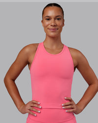 Woman wearing Flow Performance Tank - Pink Lemonade | Model:Charlize | Size:S | Thumbnail Index: 1
