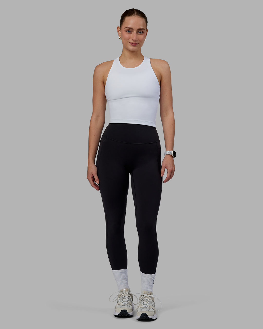 Woman wearing Flow Performance Tank - White - view 7