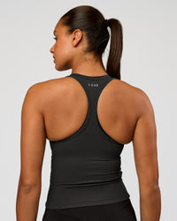 Woman wearing Flow Rib Scoop Neck Tank - Onyx | Model:Rosie | Size:S | Thumbnail Index: 1