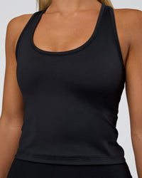 Woman wearing Flow Scoop Neck Performance Tank - Black | Model:Amity | Size:S | Thumbnail Index: 3