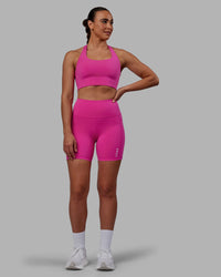 Woman wearing Flux Ultra High-Rise 6" Short Pockets - Fuchsia Pink | Thumbnail Index: 2
