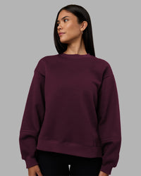 Woman wearing Full Form Fleece Sweater with Side Slits - Cherry Lacquer | Model:Rhiley | Size:S | Thumbnail Index: 2