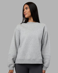 Woman wearing Full Form Fleece Sweater with Side Slits - Marl Grey | Model:Rhiley | Size:S | Thumbnail Index: 0