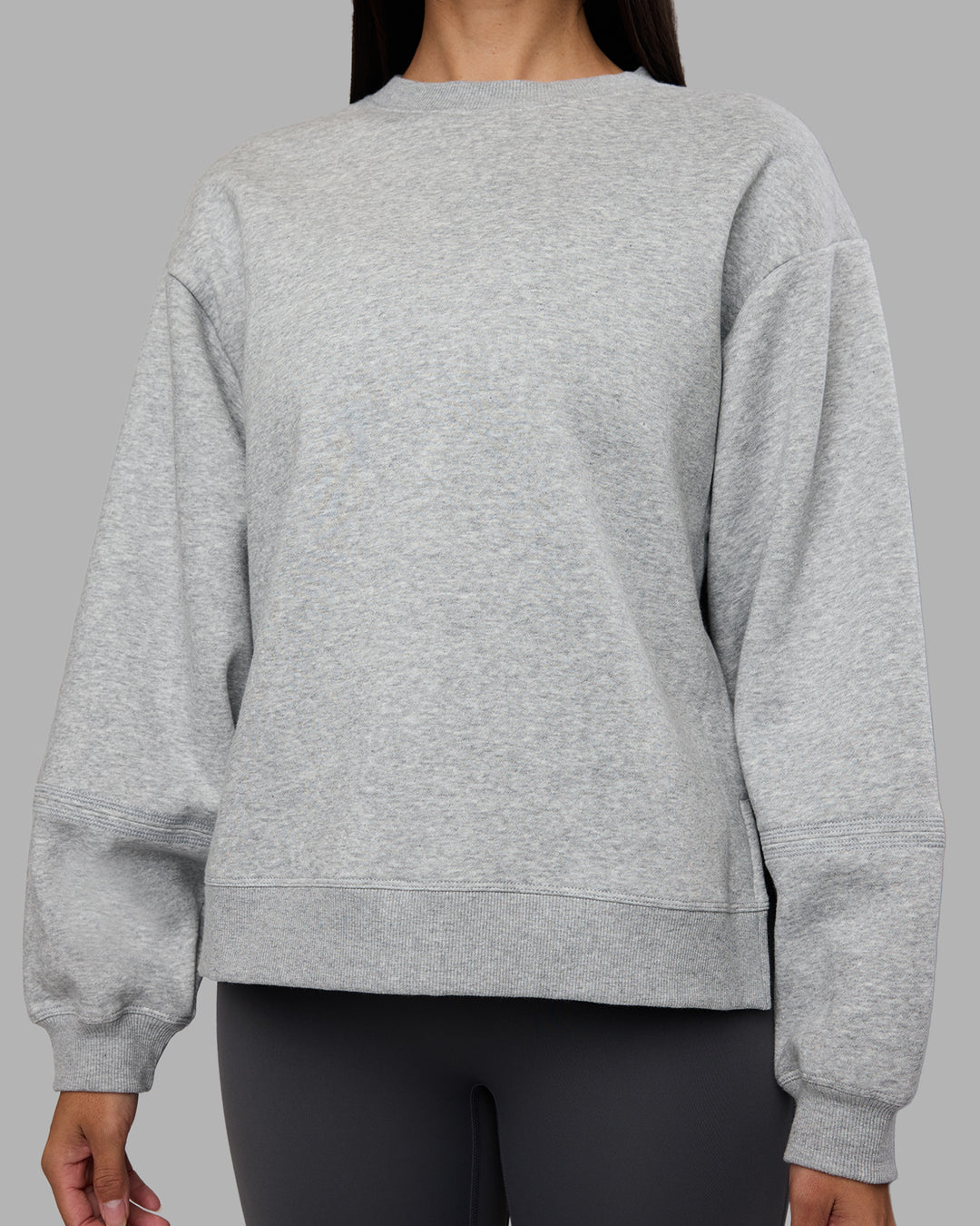 Woman wearing Full Form Fleece Sweater with Side Slits - Marl Grey | Model:Rhiley | Size:S - view 7