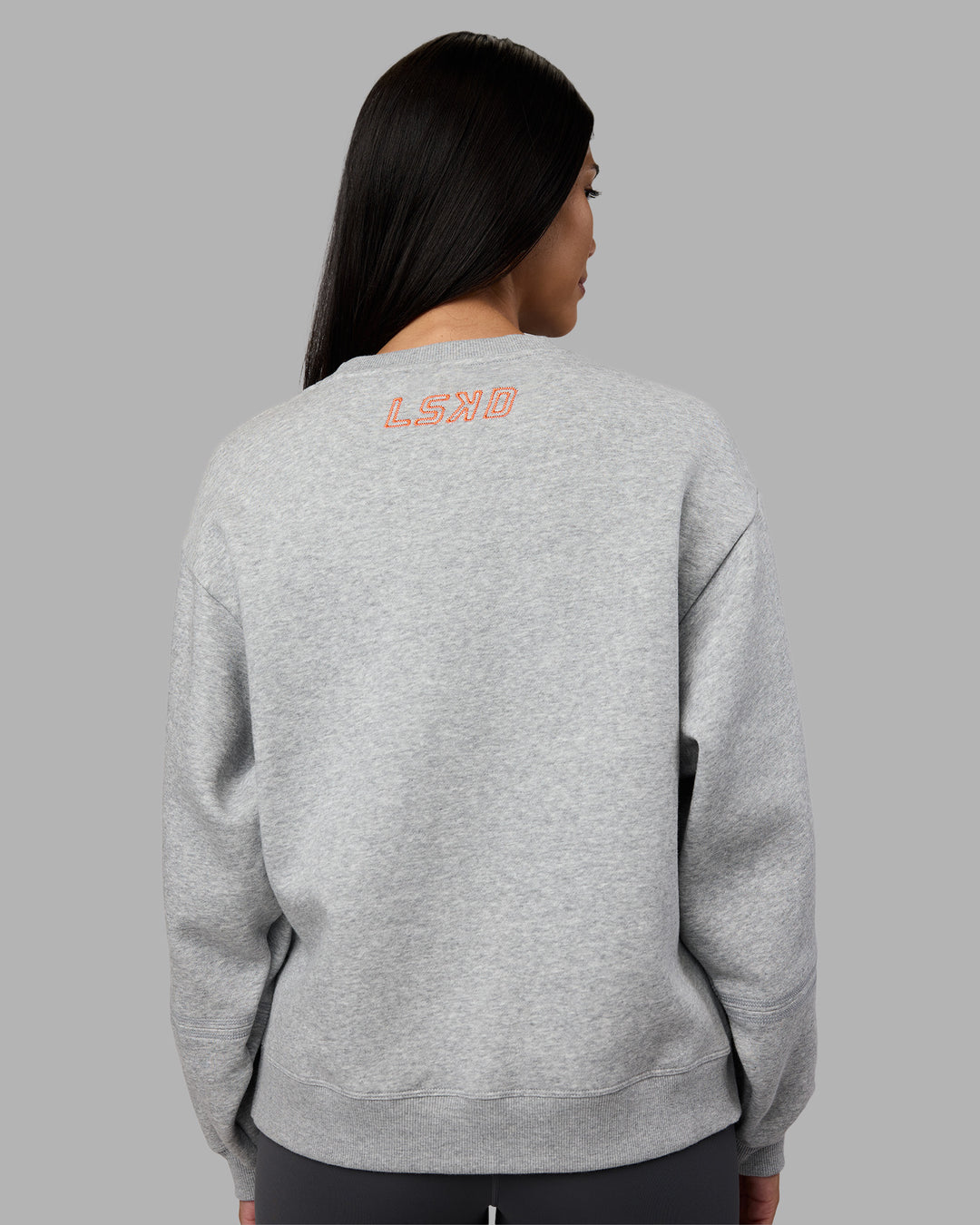 Woman wearing Full Form Fleece Sweater with Side Slits - Marl Grey | Model:Rhiley | Size:S - view 4