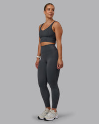 Woman wearing Function Longline Sports Bra in Dark Storm | Size:S | Thumbnail Index: 2