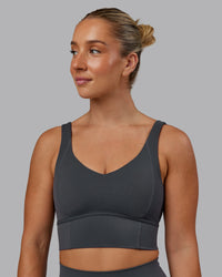 Woman wearing Function Longline Sports Bra in Dark Storm | Size:S | Thumbnail Index: 0
