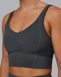 Woman wearing Function Longline Sports Bra in Dark Storm | Size:S | Thumbnail Index: 4