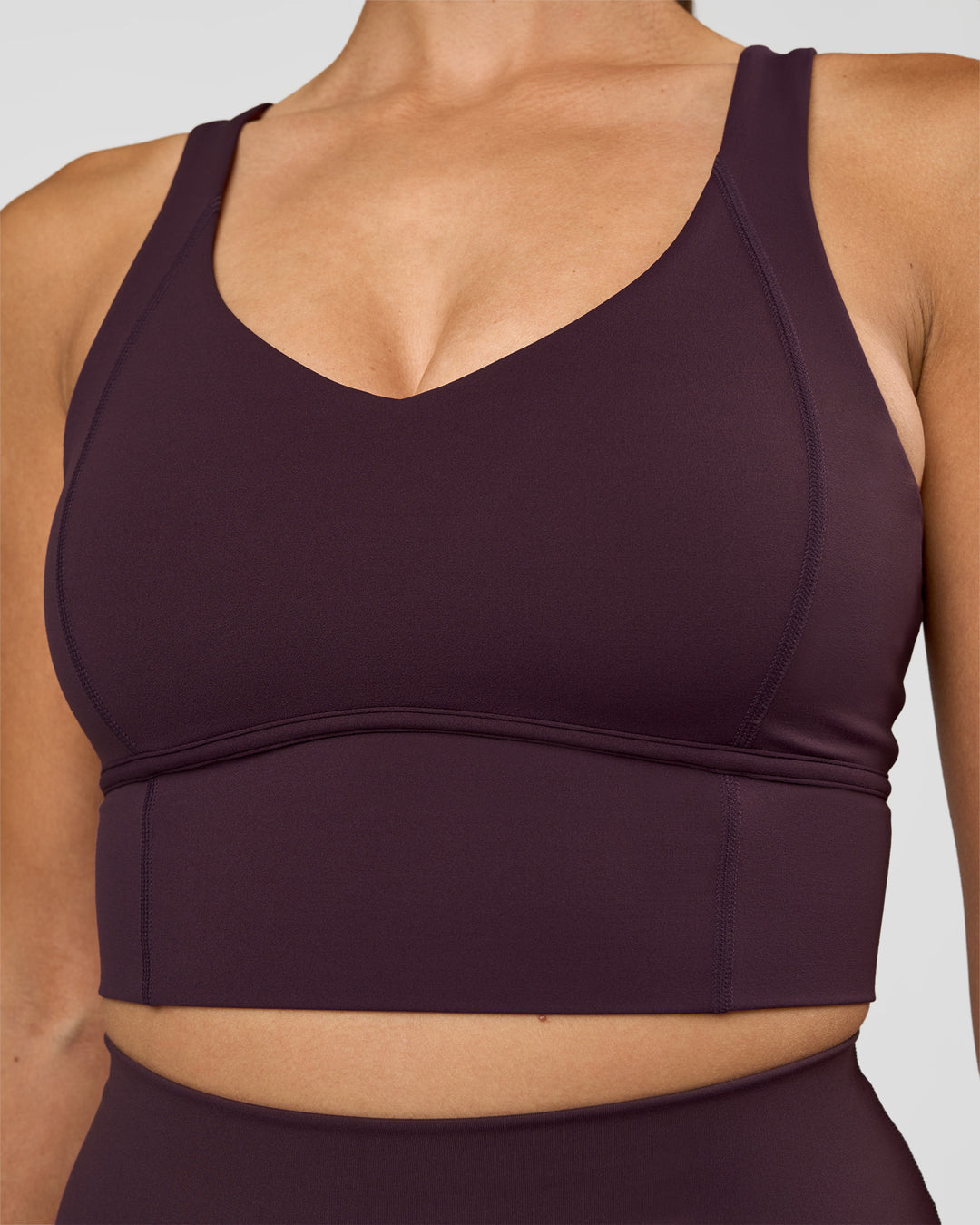 Woman wearing Function Longline Sports Bra - Midnight Plum | Model:Rhiley | Size:S - view 8