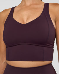 Woman wearing Function Longline Sports Bra - Midnight Plum | Model:Rhiley | Size:S | Thumbnail Index: 7
