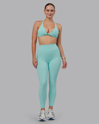 Woman wearing Fusion Ultra High-Rise 7/8 Legging - Island Paradise | Model:Lillie | Size:S | Thumbnail Index: 0