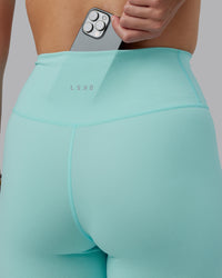 Woman wearing Fusion Ultra High-Rise 7/8 Legging - Island Paradise | Model:Lillie | Size:S | Thumbnail Index: 2