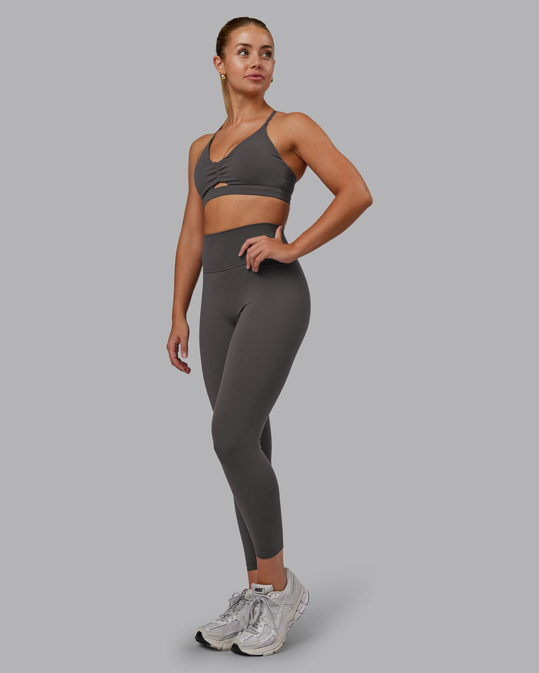 Woman wearing Fusion Ultra High-Rise 7/8 Legging - Dark Storm | Model:Hannah | Size:S - view 1