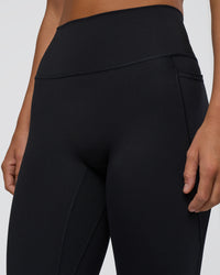 Woman wearing Fusion Ultra High-Rise 7/8 Legging Pockets - Black | Model:Amity | Size:S | Thumbnail Index: 9