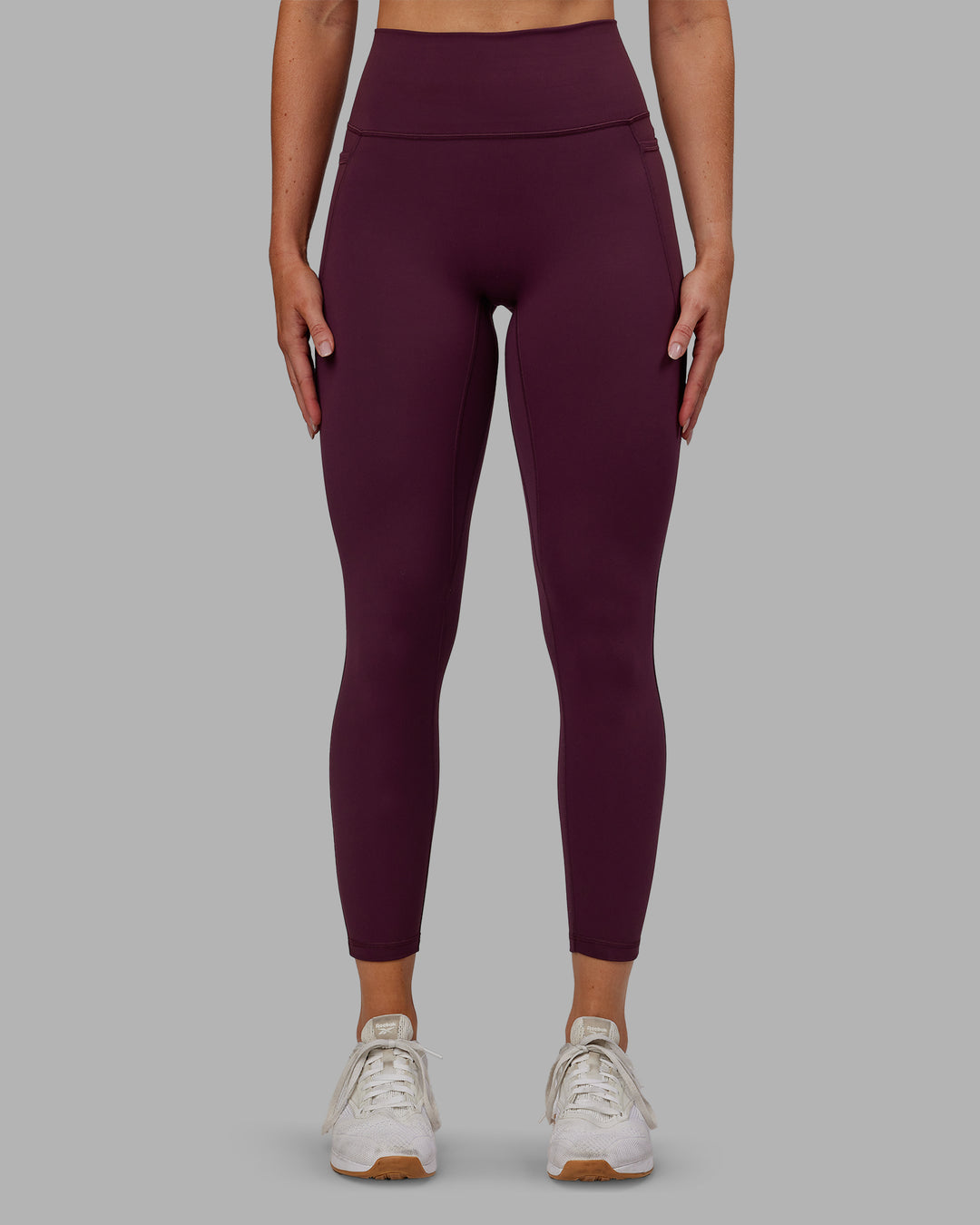 Woman wearing Fusion Ultra High-Rise 7/8 Legging Pockets - Cherry Lacquer | Model:Paris | Size:S - view 7