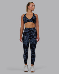 Woman wearing Fusion Ultra High-Rise 7/8 Legging Pockets - Tie Dye-Midnight | Model:Halle | Size:S | Thumbnail Index: 3