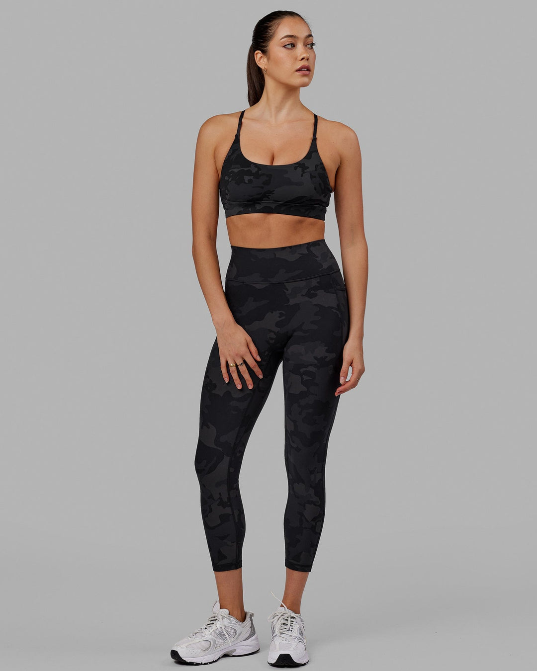 Woman wearing Fusion Ultra High-Rise 7/8 Legging Pockets - Black-Camo | Model:Katie | Size:S - view 3