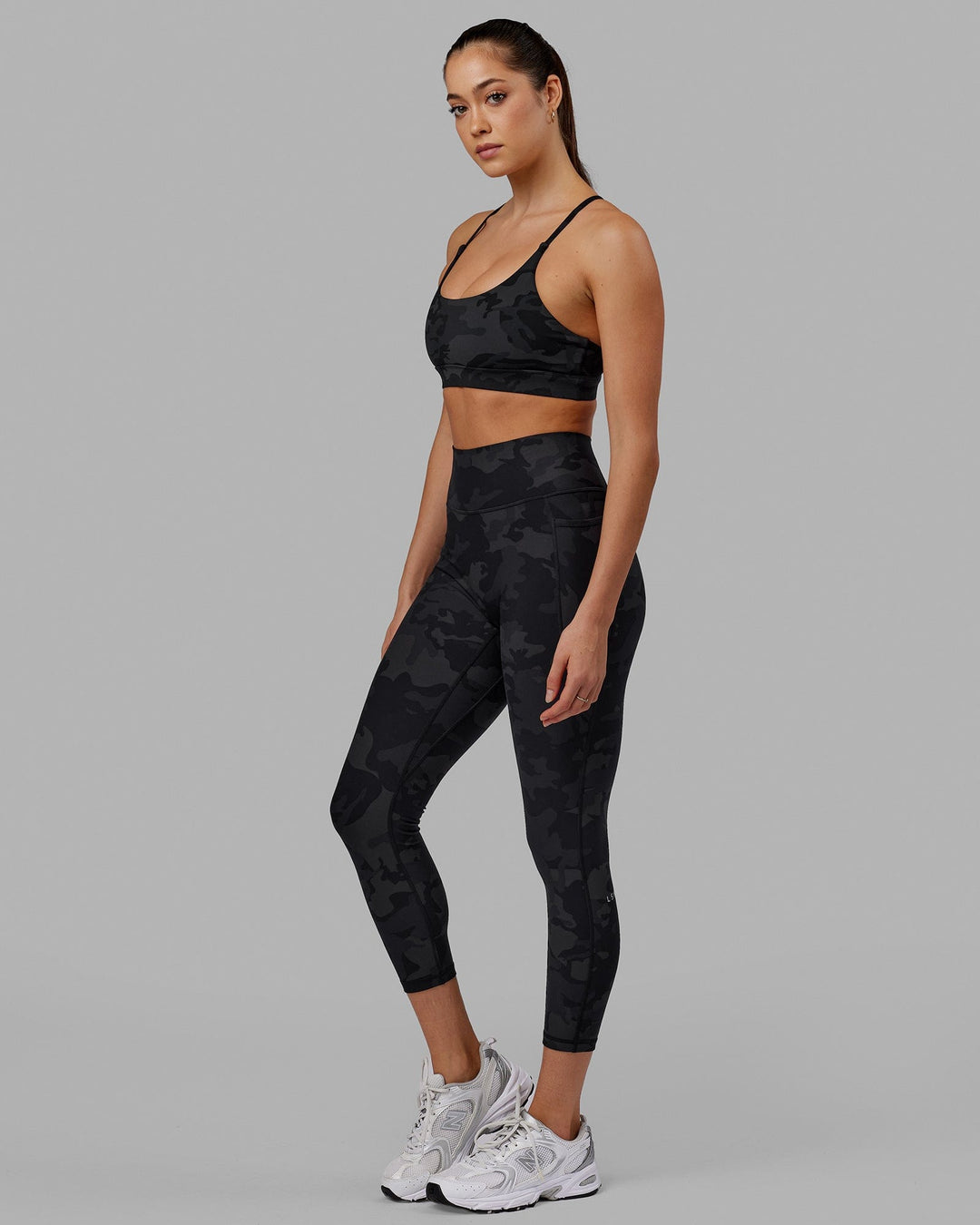 Woman wearing Fusion Ultra High-Rise 7/8 Legging Pockets - Black-Camo | Model:Katie | Size:S - view 8