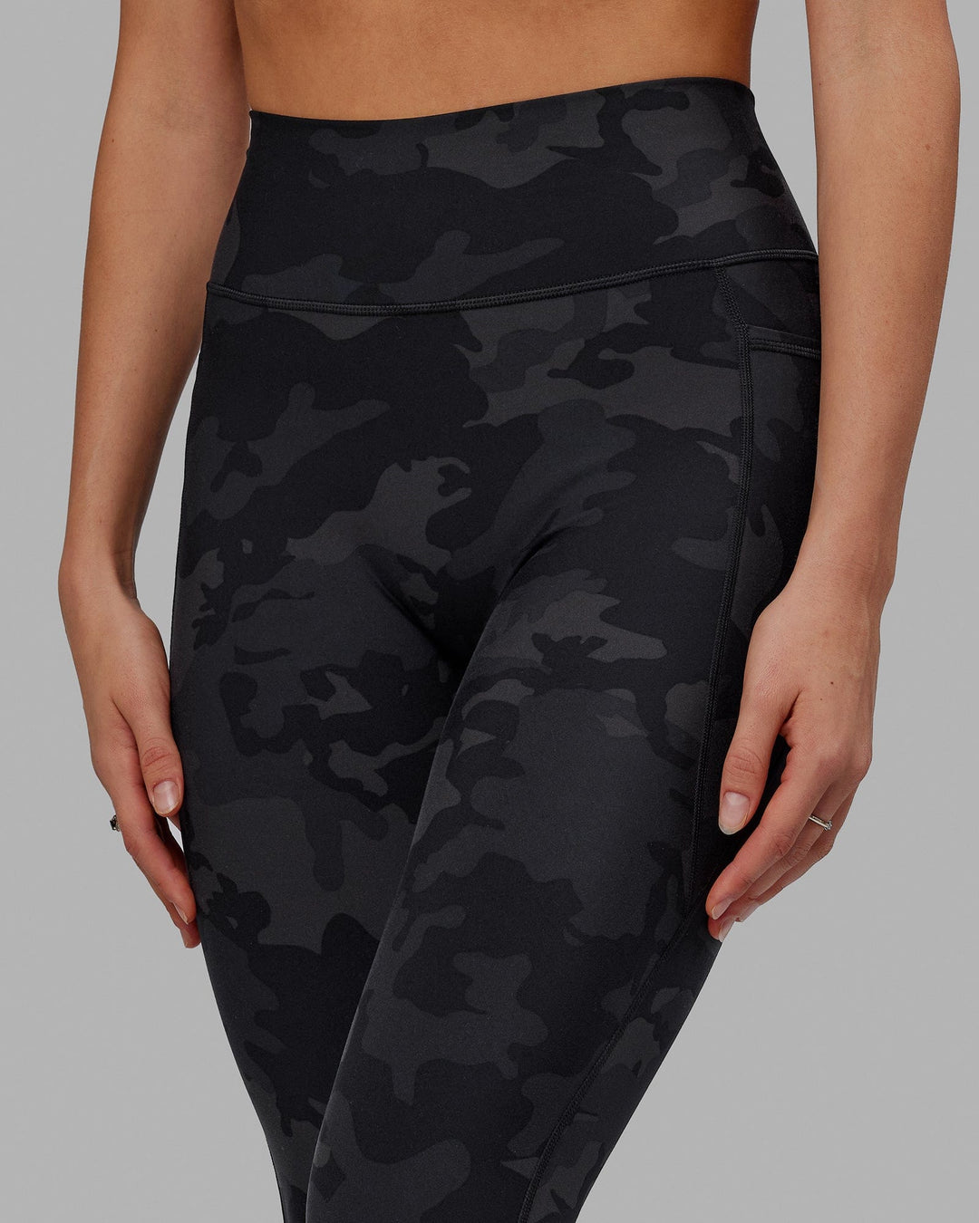 Woman wearing Fusion Ultra High-Rise 7/8 Legging Pockets - Black-Camo | Model:Katie | Size:S - view 5