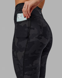 Woman wearing Fusion Ultra High-Rise 7/8 Legging Pockets - Black-Camo | Model:Katie | Size:S | Thumbnail Index: 6