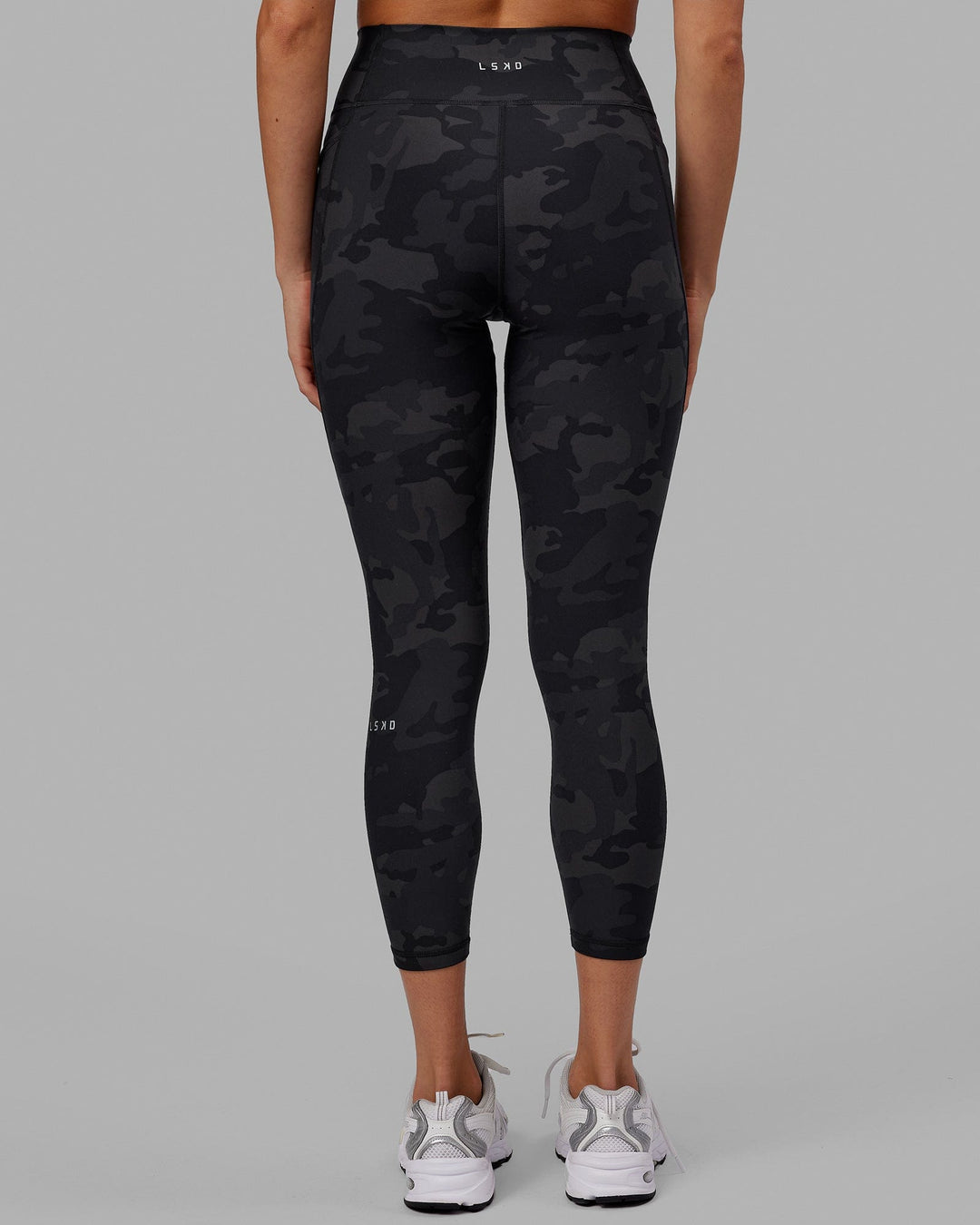 Woman wearing Fusion Ultra High-Rise 7/8 Legging Pockets - Black-Camo | Model:Katie | Size:S - view 4