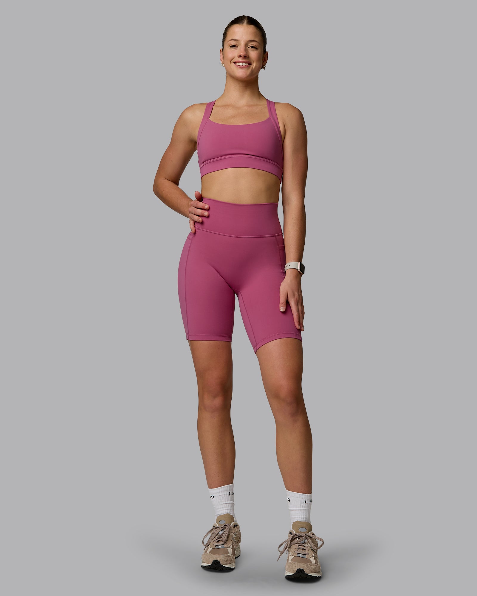 Woman wearing Fusion Ultra High-Rise 9" Short Pockets - Mauve Haze | Model:Chloe | Size:XS