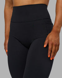 Woman wearing Fusion Ultra High-Rise Full Length Legging Pockets - Black | Model:Georgia | Size:S | Thumbnail Index: 6